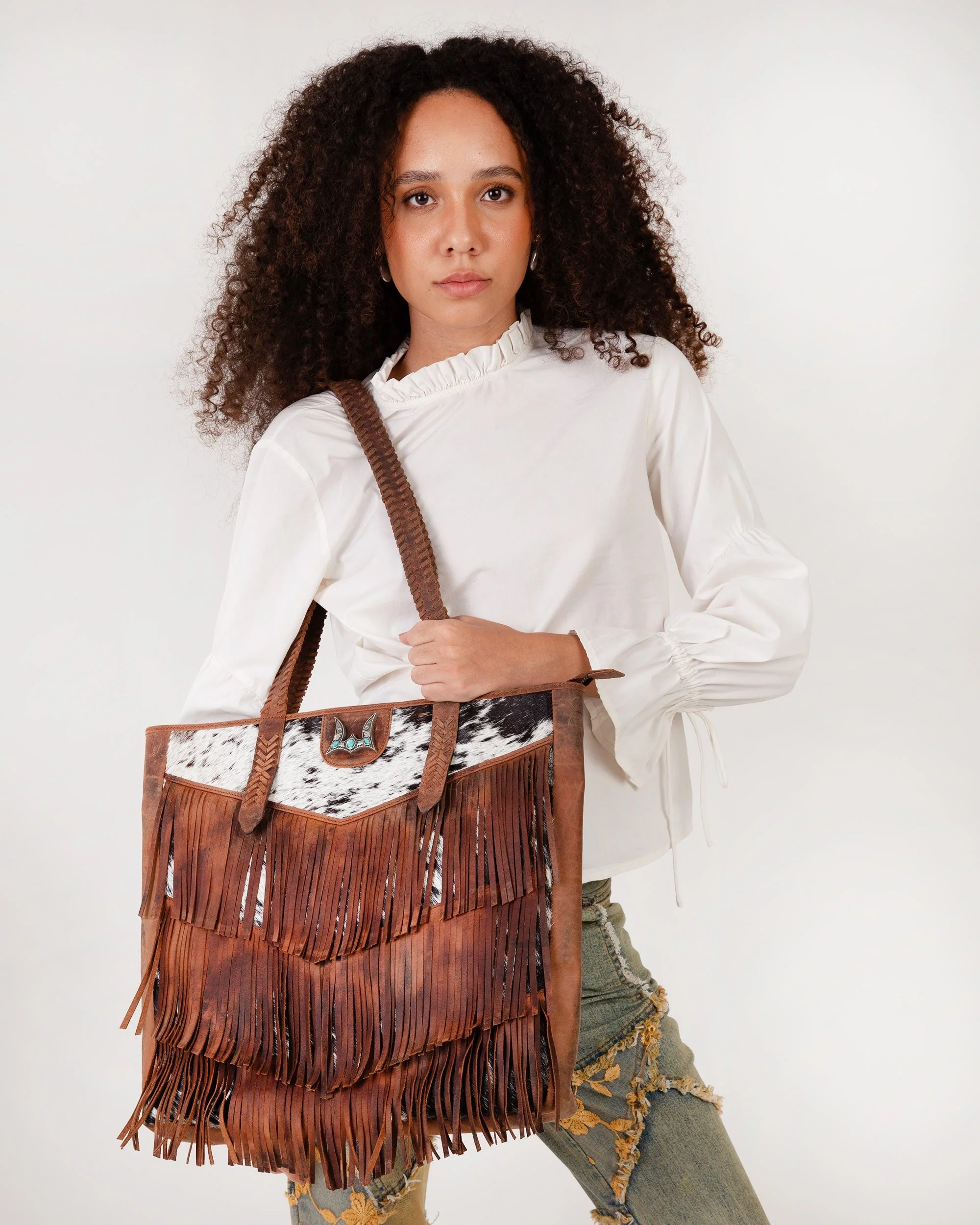 7637-loyal-west-hide-and-fringe-large-cowhide-purse-1.webp
