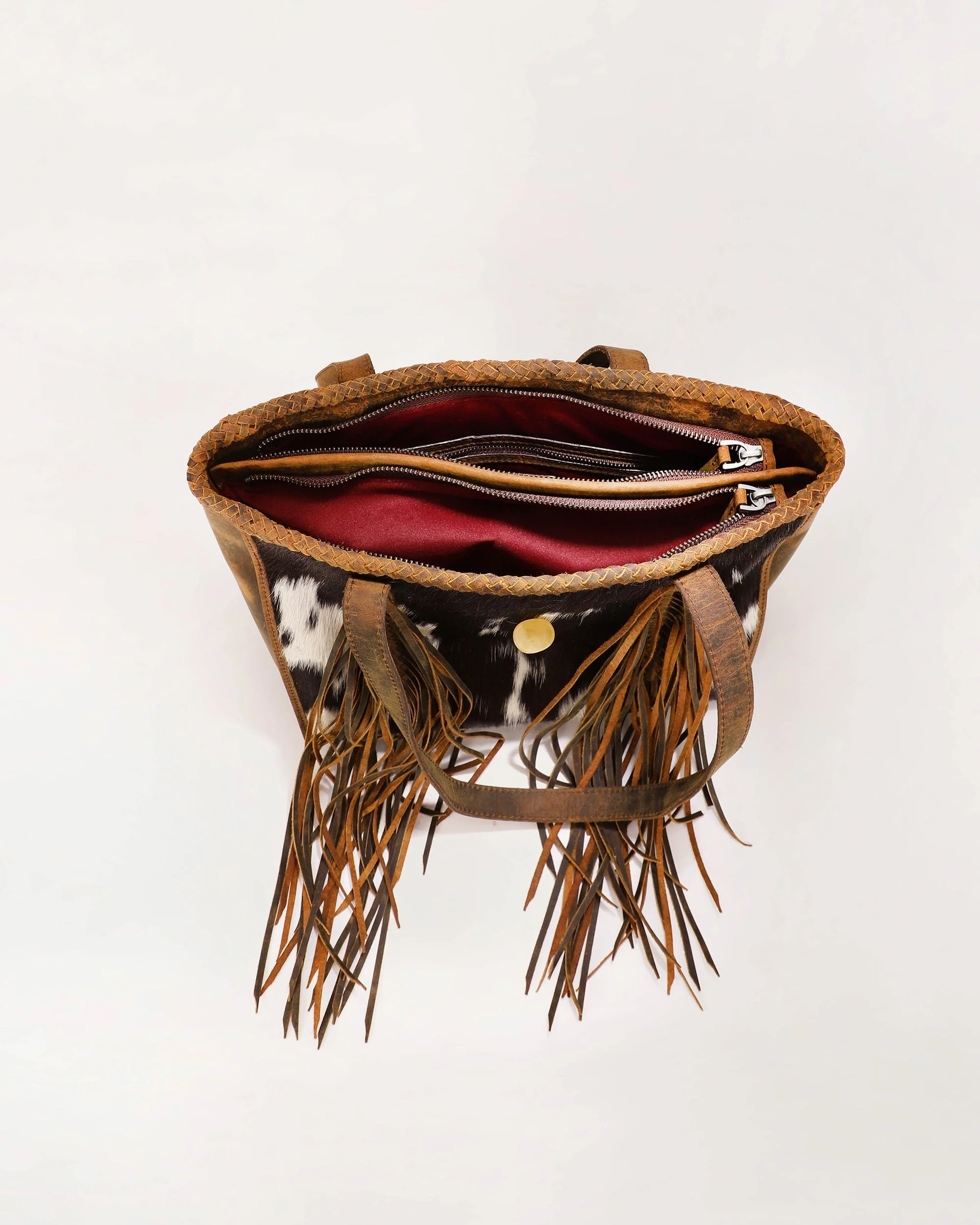 7638-loyal-west-hide-and-fringe-medium-cowhide-purse-1.webp