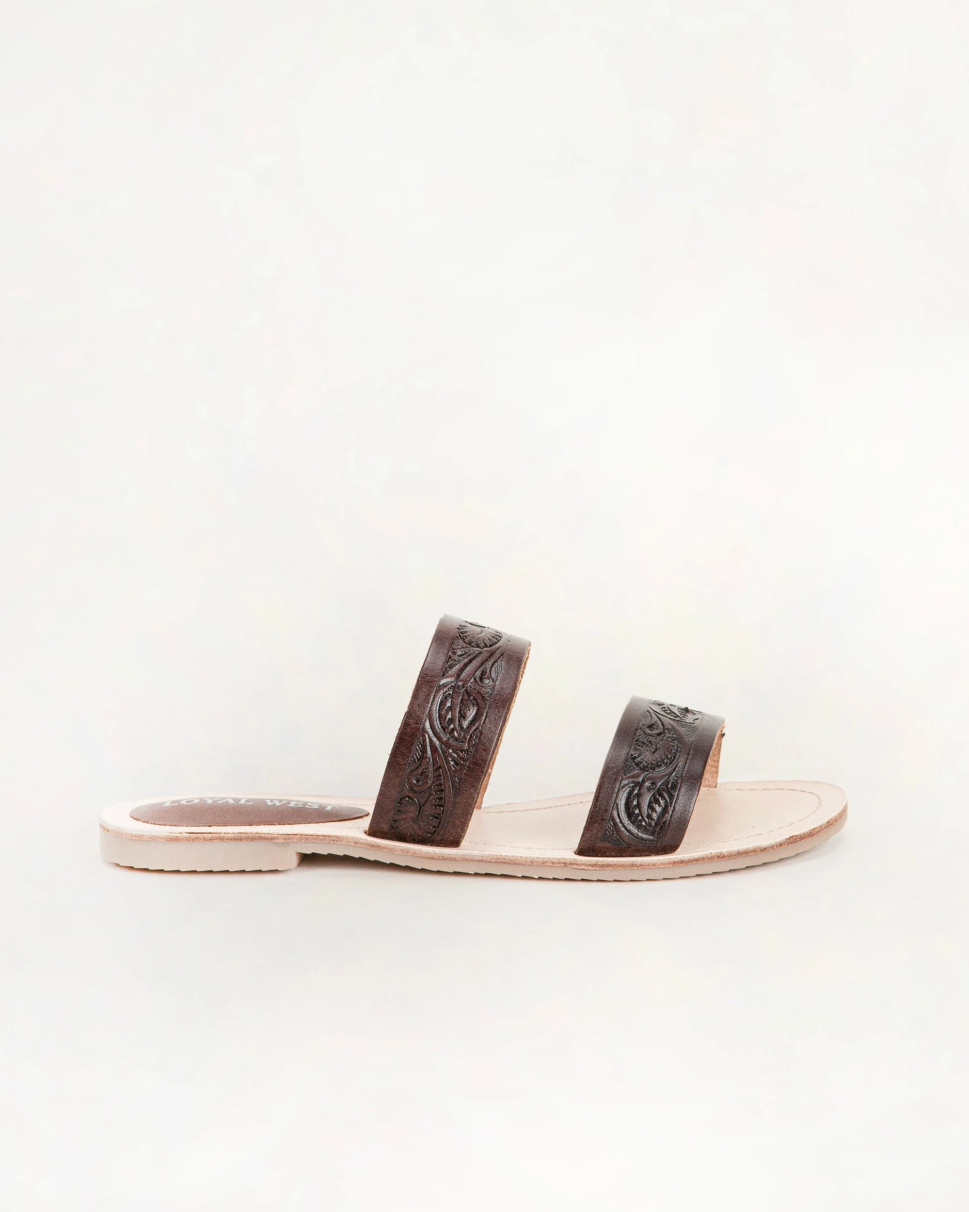 7714-loyal-west-mesa-wanderer-sandals-black-handtooled-leather-1.webp