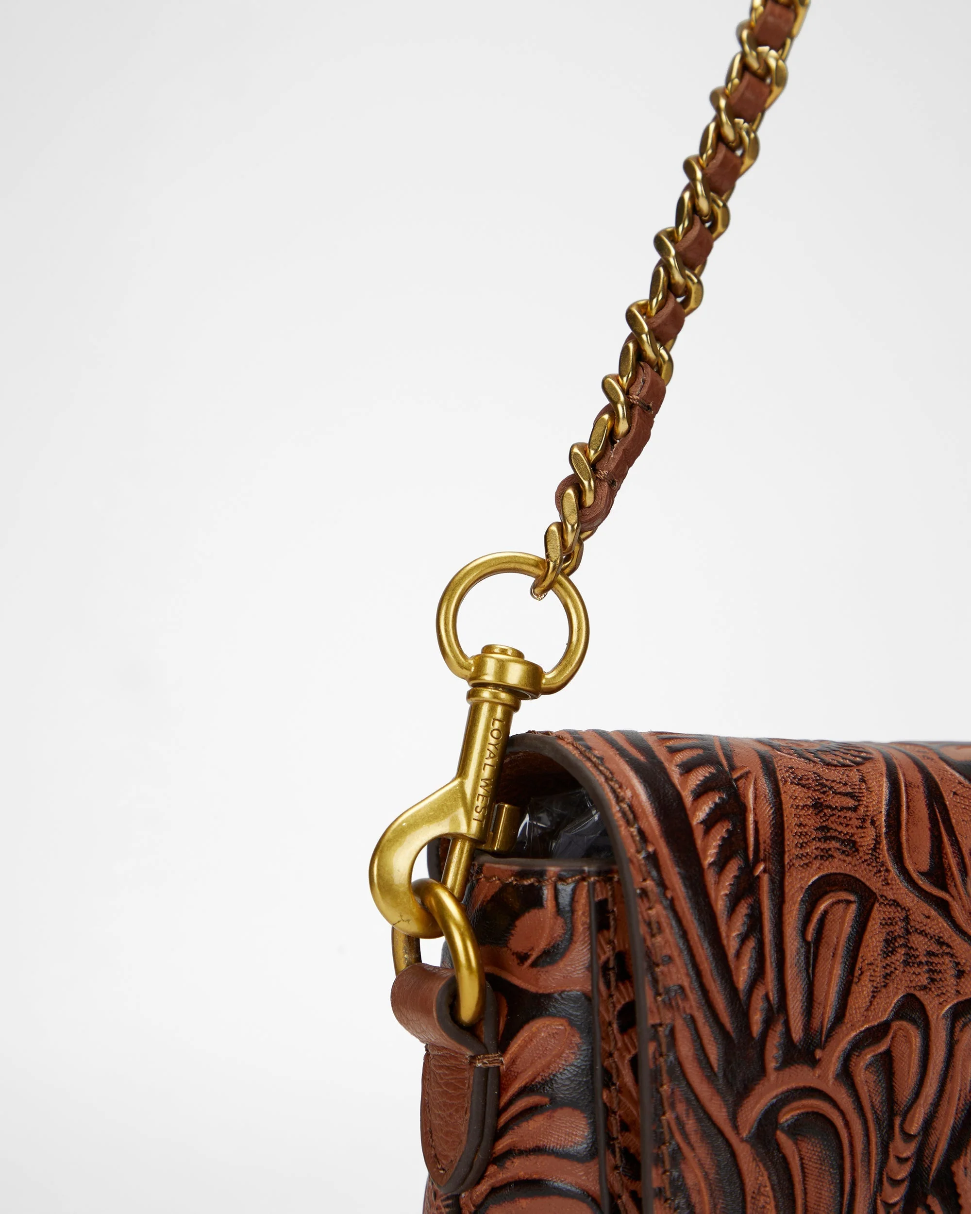 7777-loyal-west-savi-mini-bag-in-hand-finished-embossed-leather-brown-1.webp