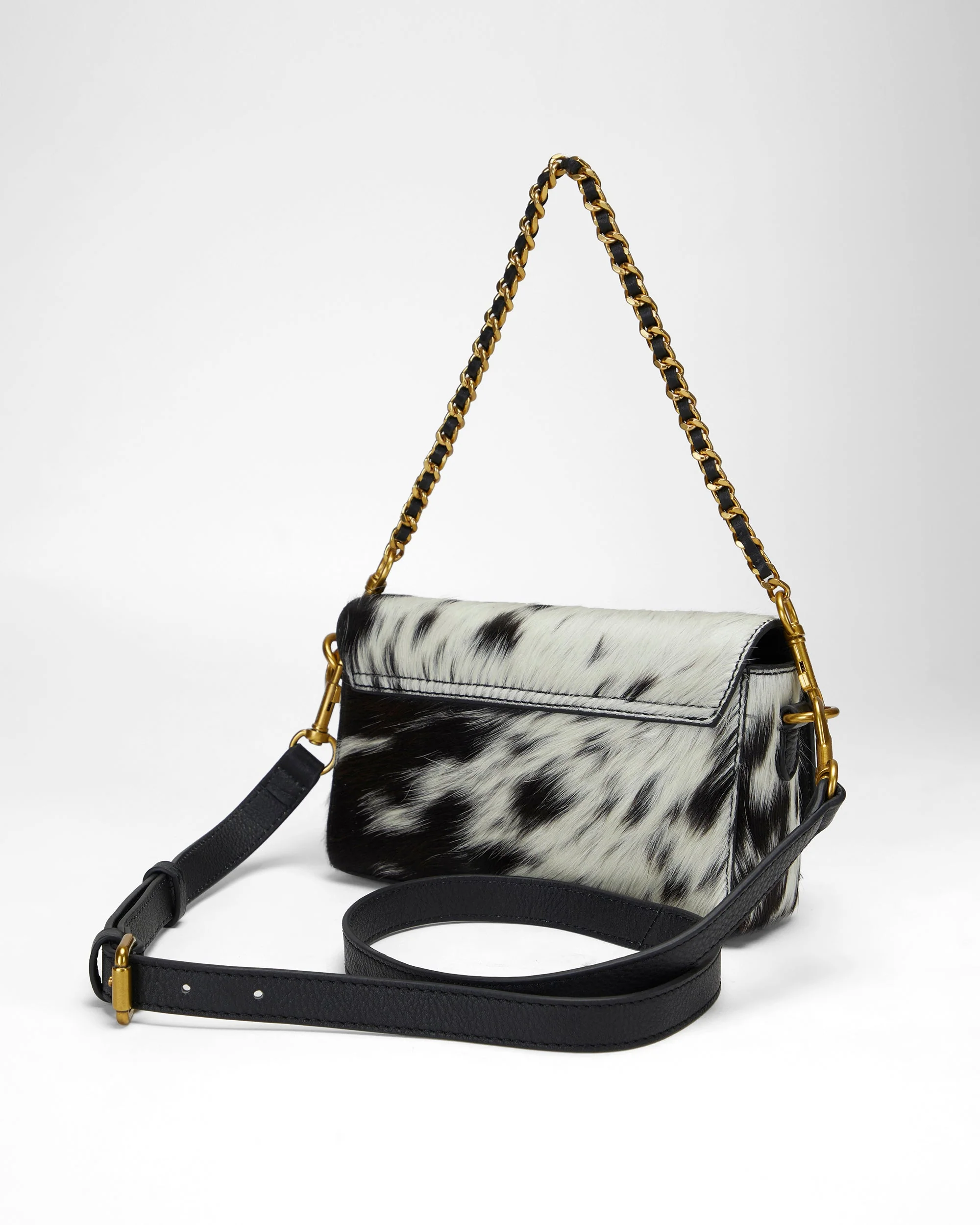 7779-loyal-west-savi-mini-bag-in-black-white-cowhide-1.webp