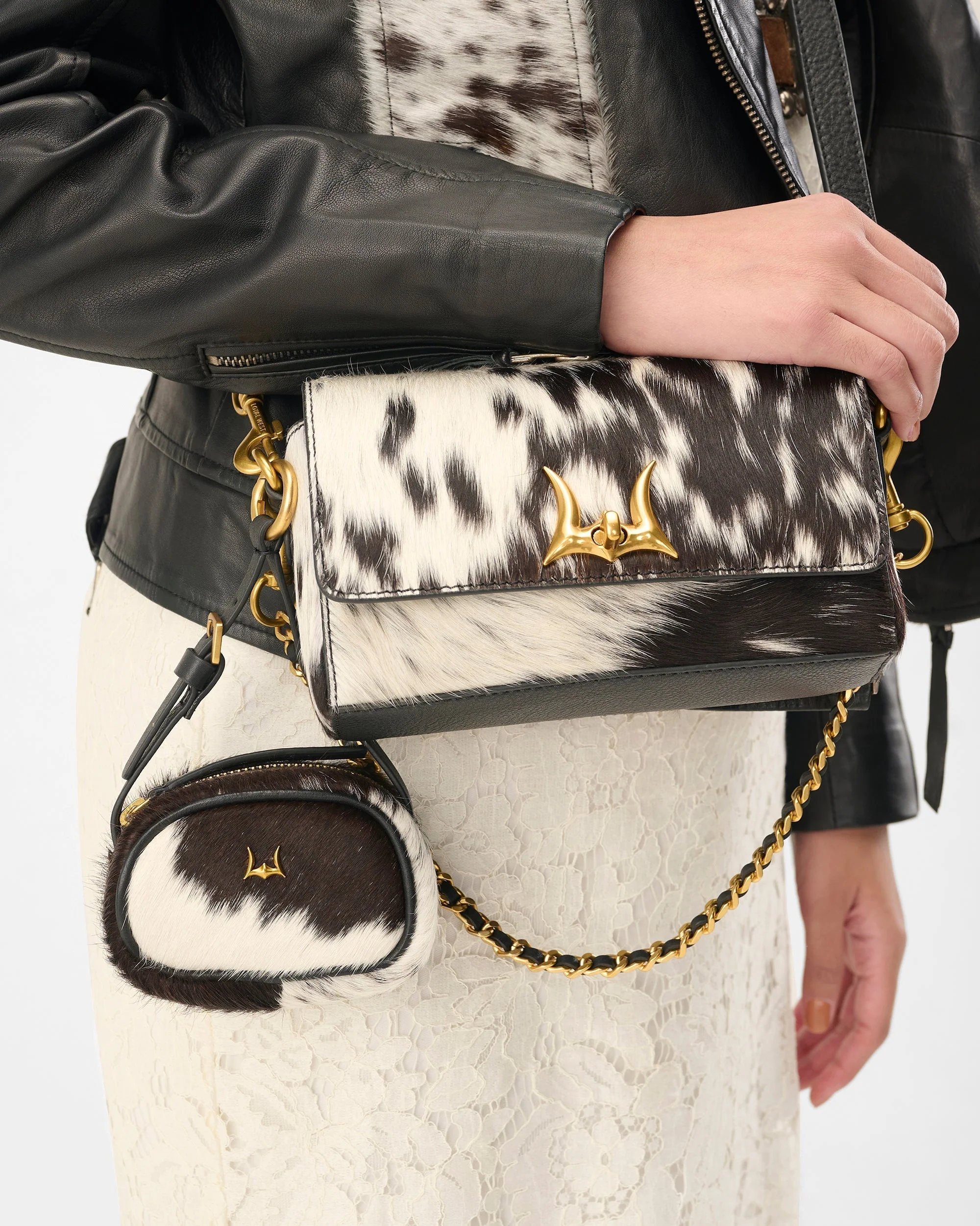 7779-loyal-west-savi-mini-bag-in-black-white-cowhide-1.webp