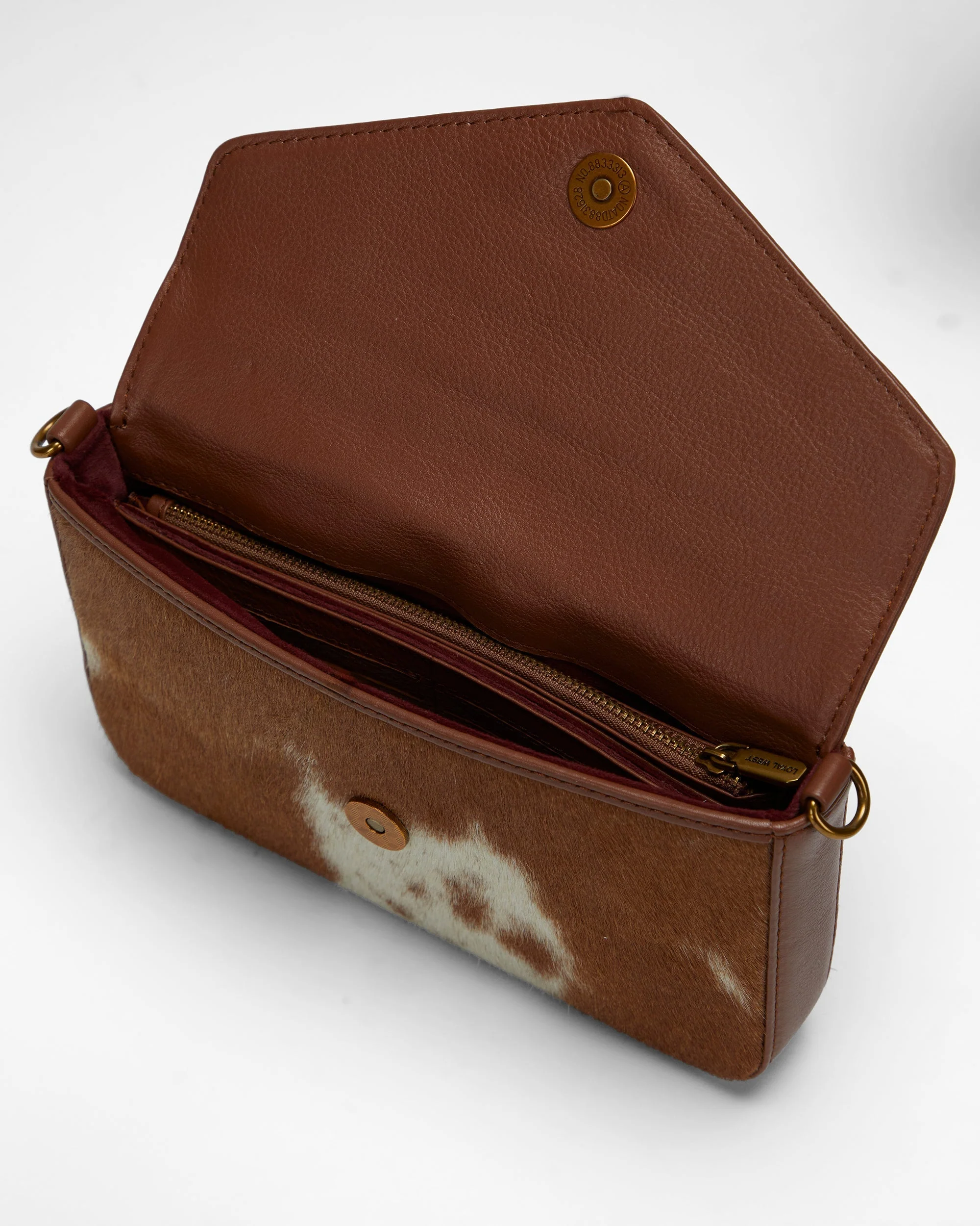 7861-loyal-west-the-lw-on-the-go-mini-chain-bag-in-brown-white-cowhide-and-calfskin-1.webp
