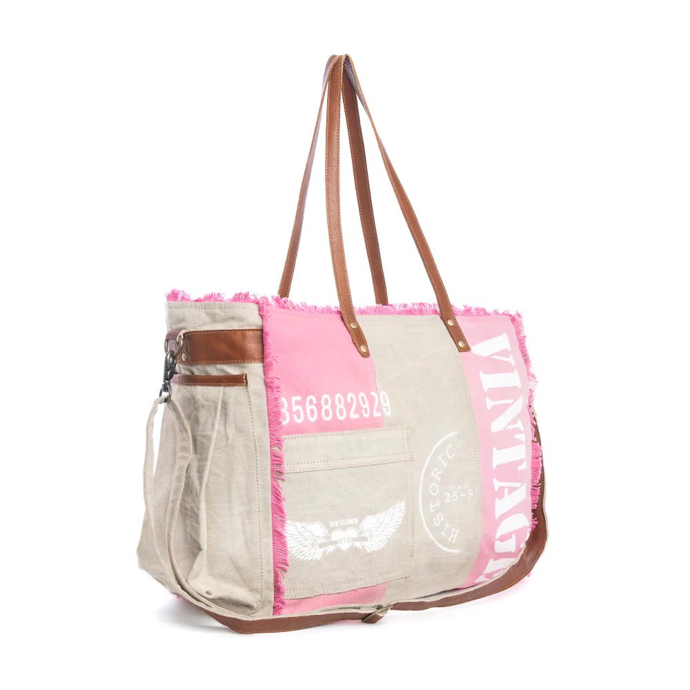 9193-myra-queen-creek-weekender-bag-in-pink-spacious-leather-travel-tote-with-patchwork-leather-handles-and-playful-retro-vibes-1.webp