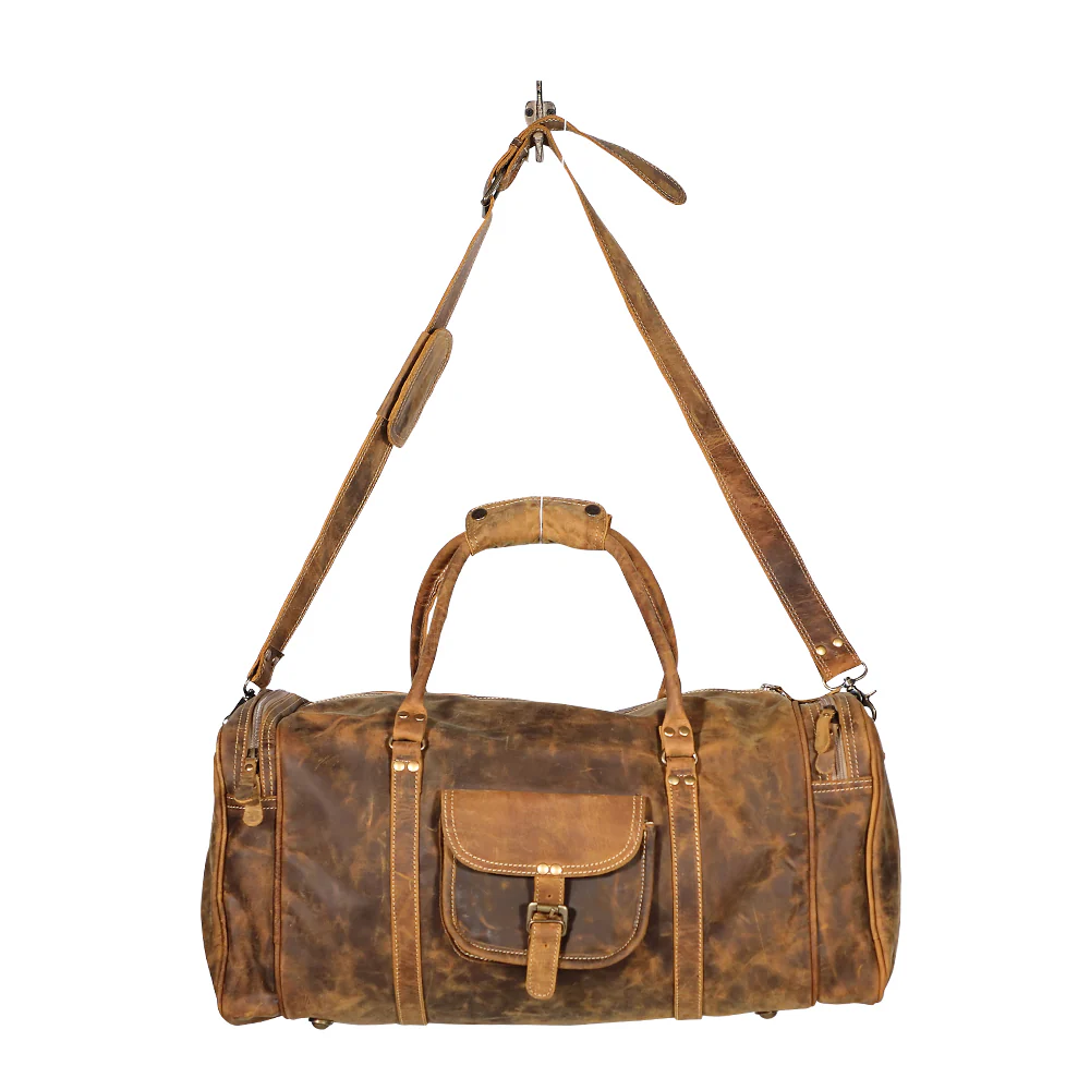 9221-myra-soulful-leather-traveller-bag-cowgirl-inspired-duffle-bag-with-buckled-pocket-and-sturdy-handles-for-rustic-getaways-1.webp