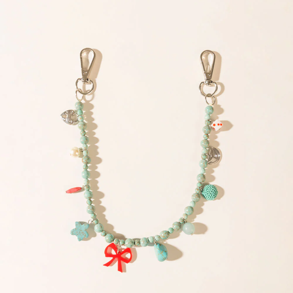 Ninaâs Lucky Bag Charm in Ocean Blue
