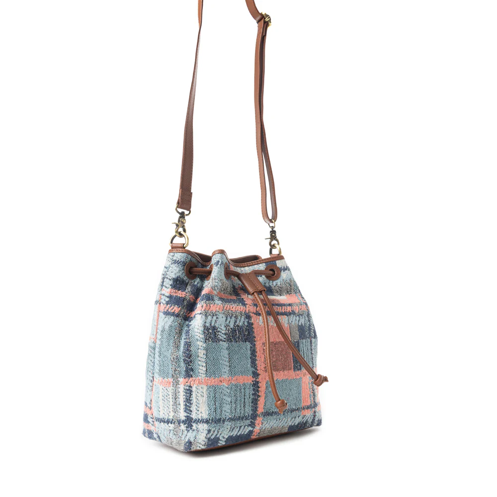 9854-pastel-desert-sunrise-bucket-bag-in-blue-1.webp