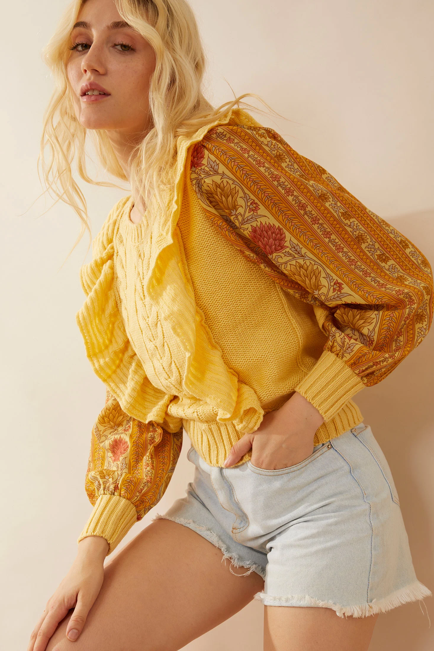 9990-penelope-ruffled-sweater-in-sunrise-yellow-1.webp