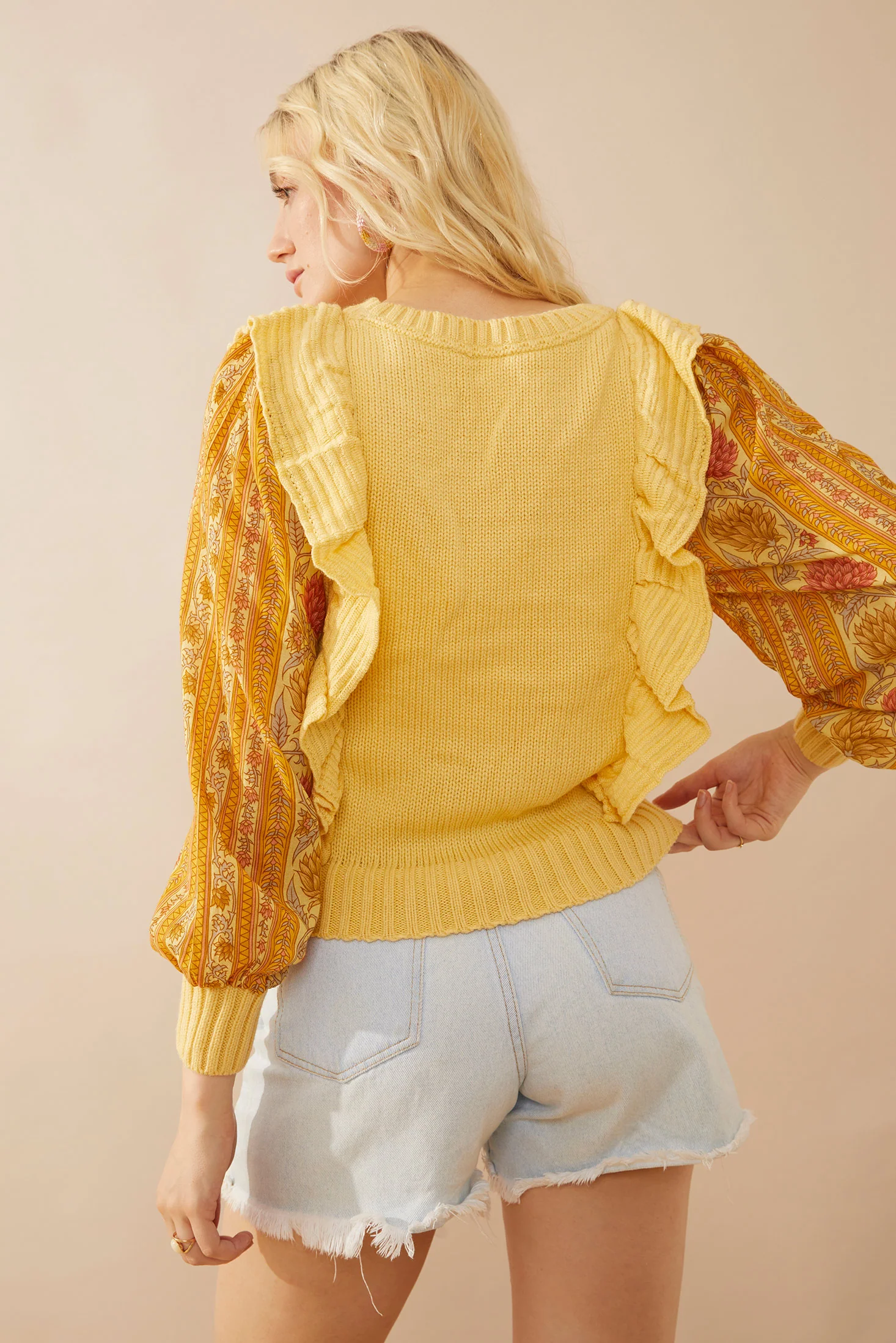 9990-penelope-ruffled-sweater-in-sunrise-yellow-1.webp